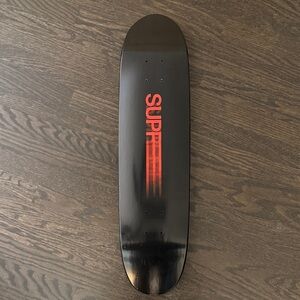 Supreme Black Skateboard with Red Logo